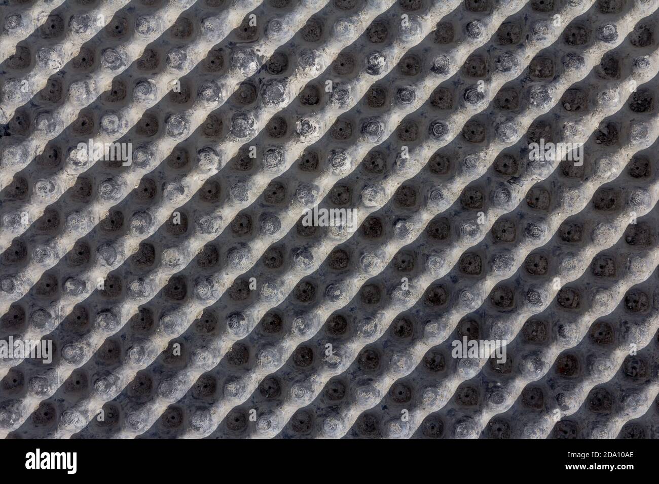 Industrieller Hintergrund. Material für die Abdichtung Nahaufnahme. Der Einsatz moderner Technologien für die Abdichtung von Fundamenten von Gebäuden und Straßen. Stockfoto