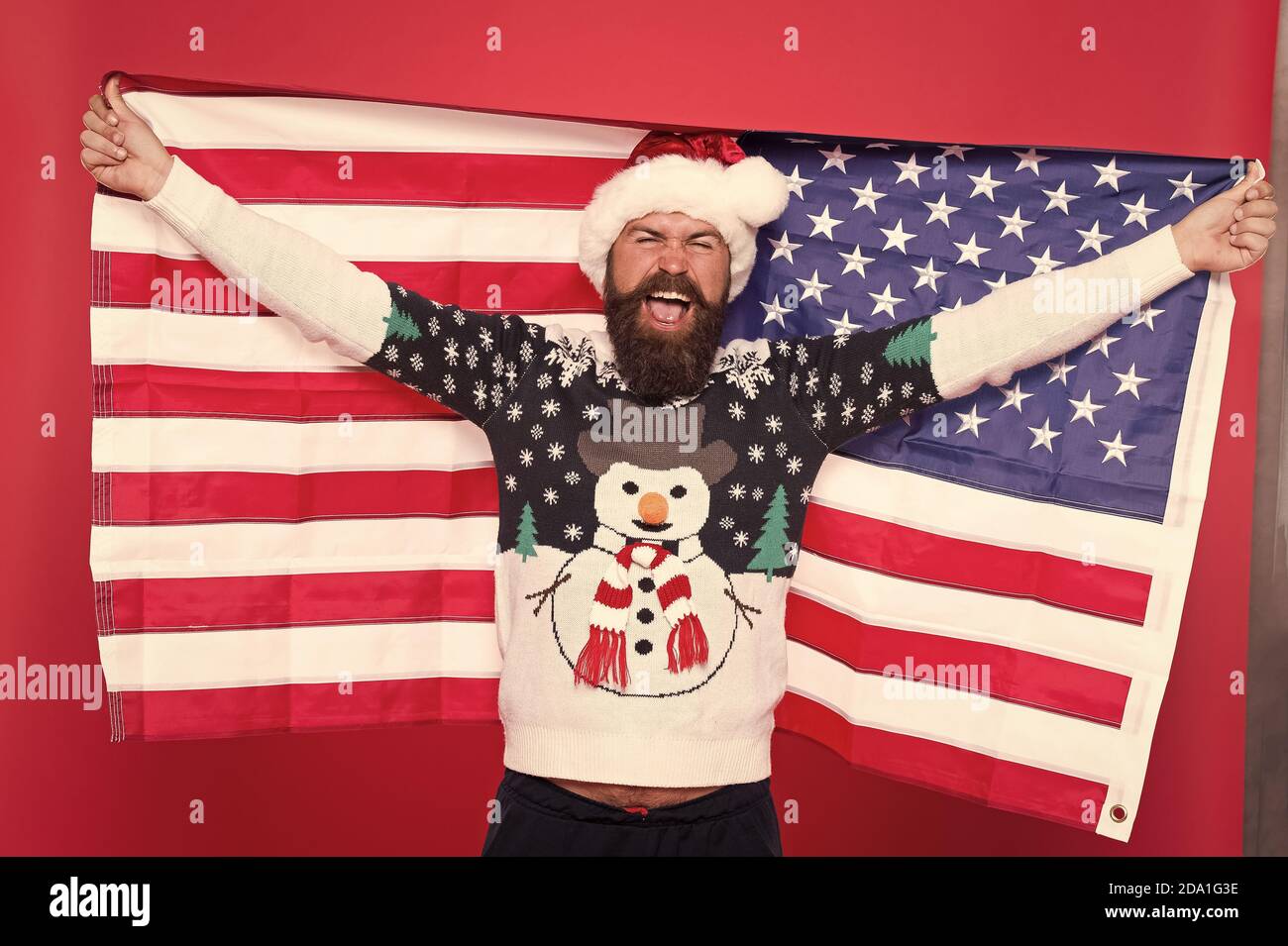 Patriotismus ist einfach in Amerika zu verstehen. Weihnachten in den Vereinigten Staaten von Amerika. Grüße an alle meine Landsleute. Nationaler Geist. Weihnachtsfeiertag. Guy Weihnachten feiern. Fröhliche Hipster. Stockfoto