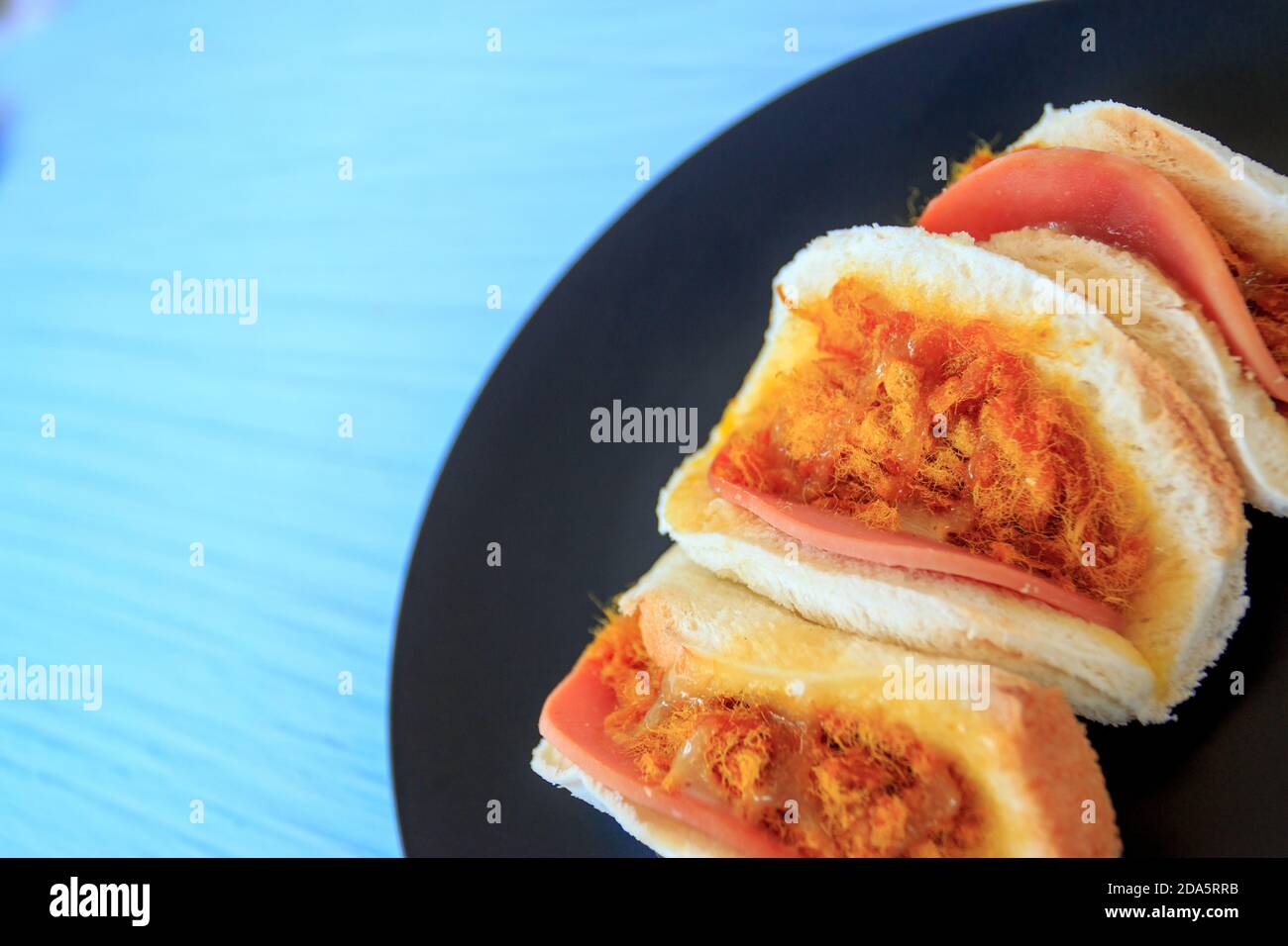 Traditionelle Sandwiches, Flossy Schweinefleisch und Schinken Salat Dressing Stockfoto