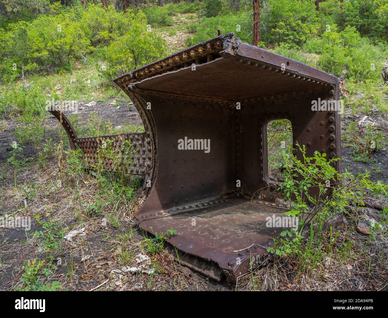 Rostige Ausrüstung auf Dean's Saw Mill Gelände, Chicken Creek Trail nördlich von Mancos State Park, Mancos, Colorado. Stockfoto