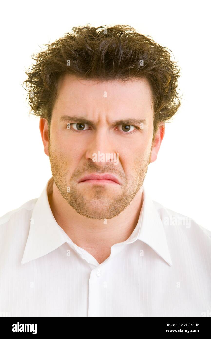 Der junge Mann sieht frustriert aus Stockfoto