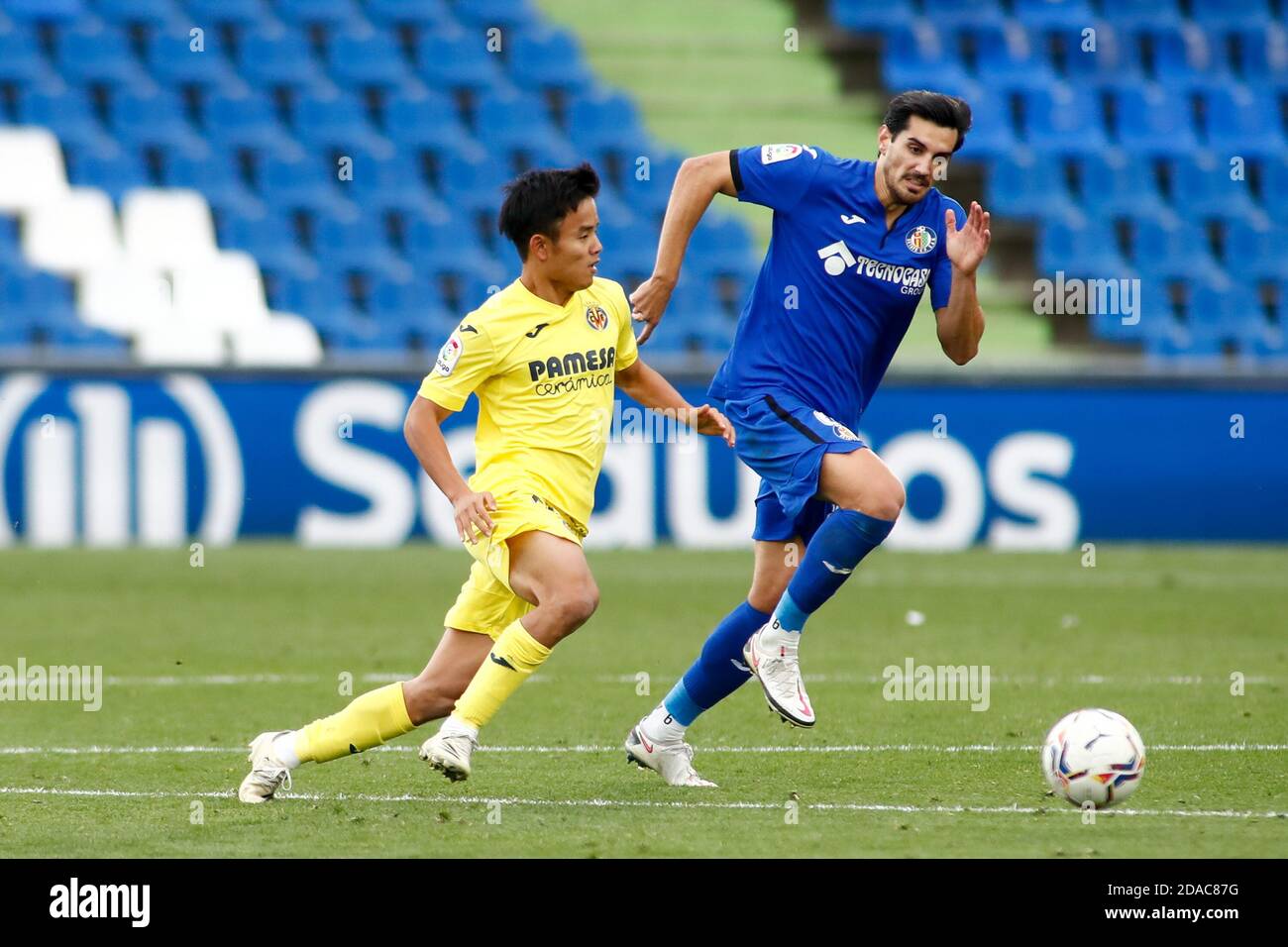 Jose Manuel 'Chema' Rodriguez von Getafe und Takefusa Kubo von Villarreal in Aktion während der spanischen Meisterschaft La Liga Fußball Übereinstimmung zwischen get P Stockfoto