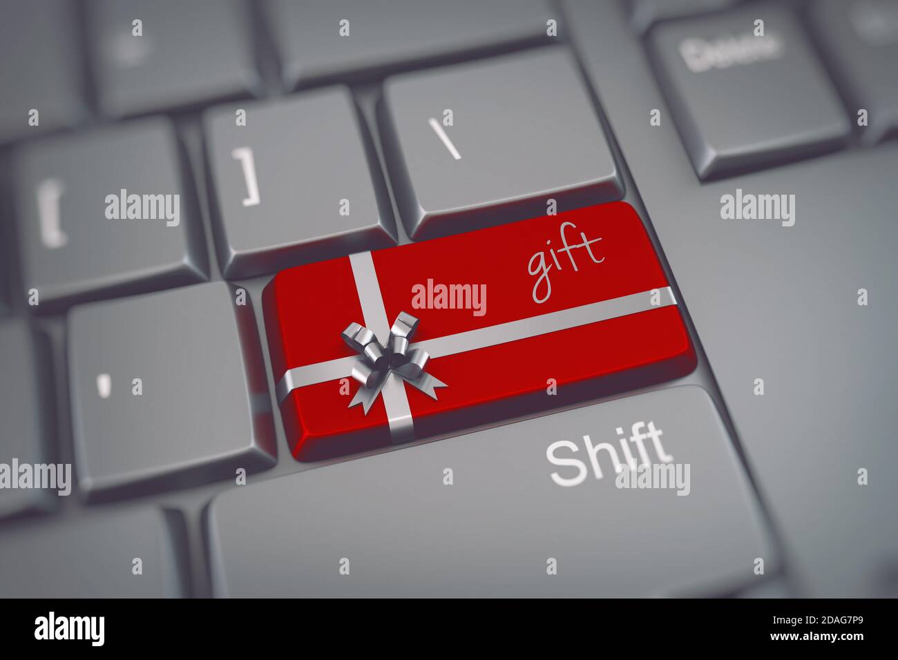Drücken Sie die Tastaturtaste, um ein Weihnachtsgeschenk zu kaufen Stockfoto