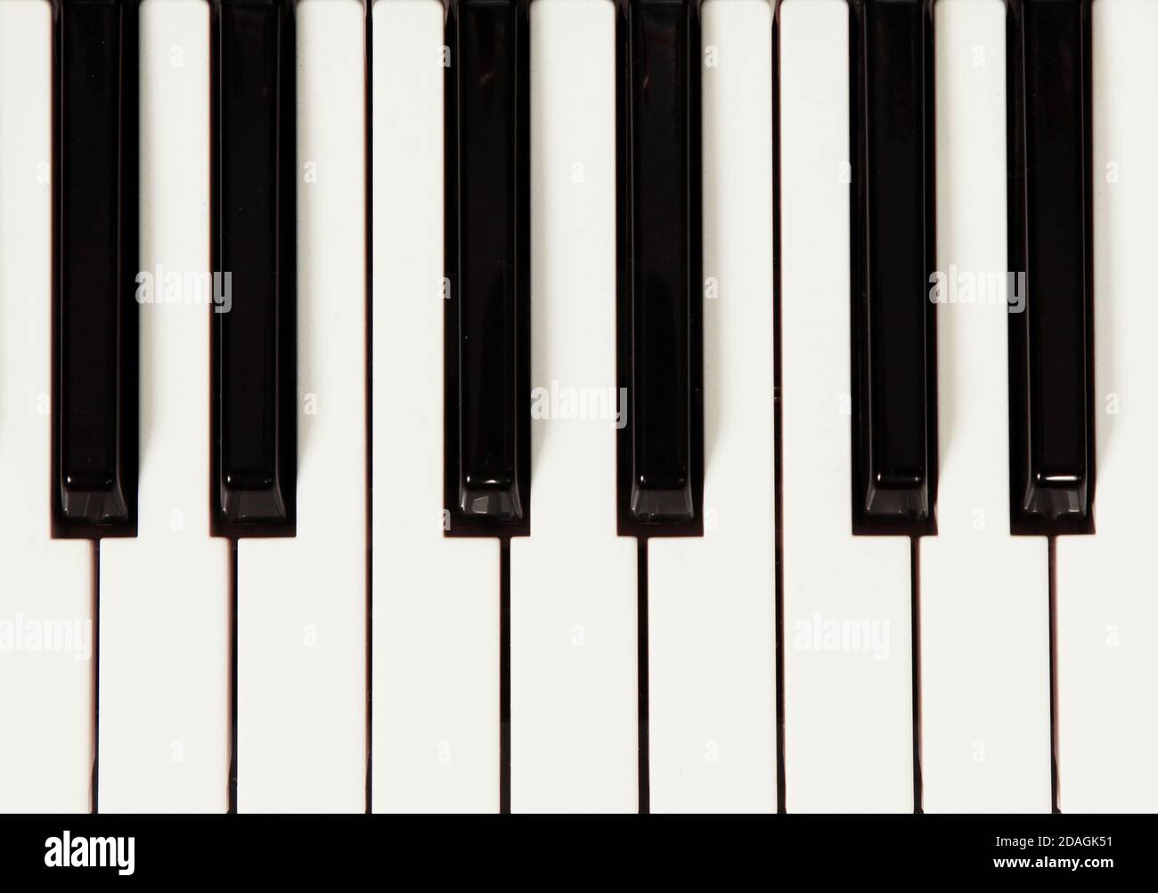 Klaviertasten für einen Hintergrund Stockfoto