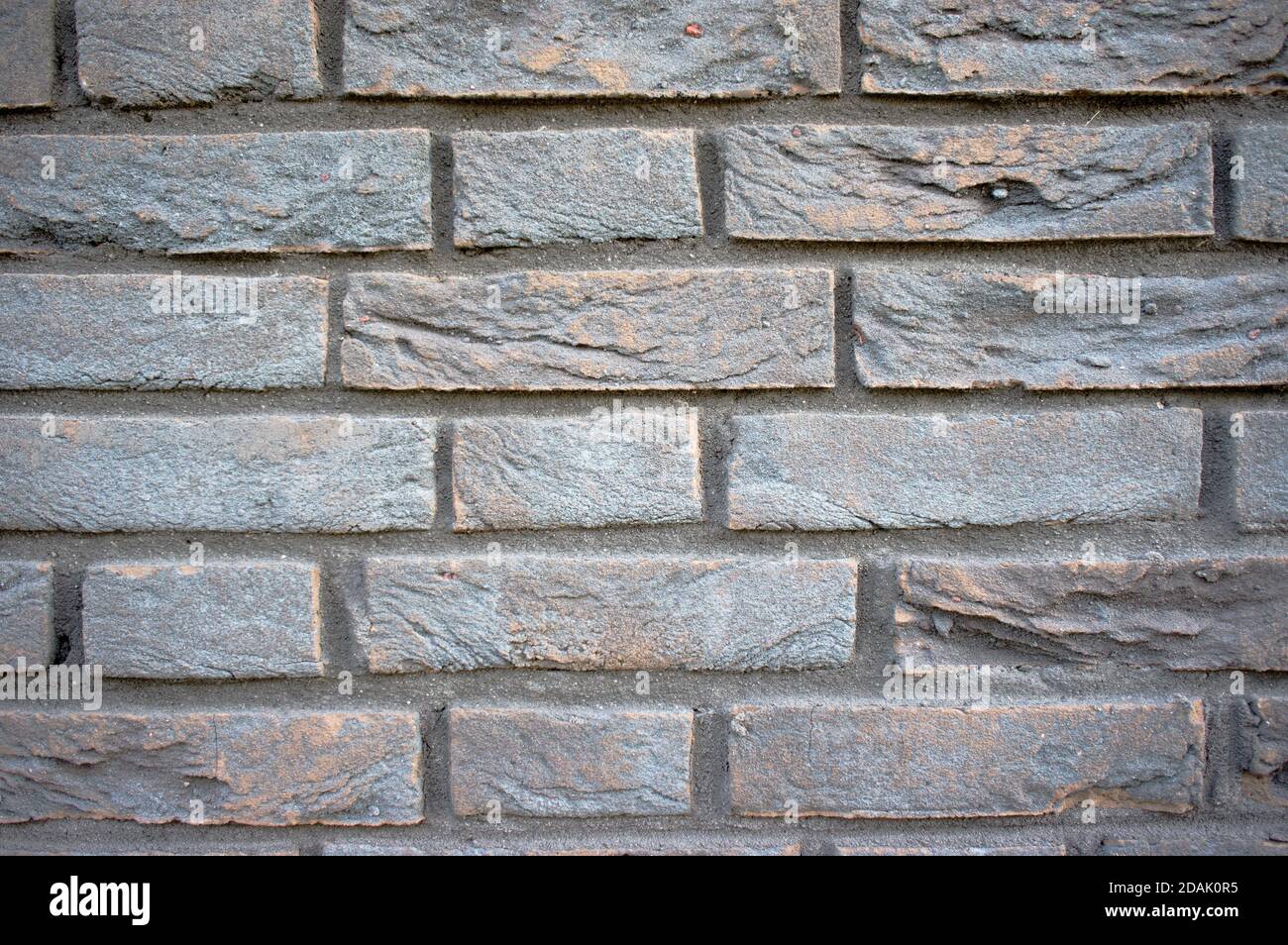 Schwarz verfallenen Stein gemauerte Wand Hintergrund Stockfoto