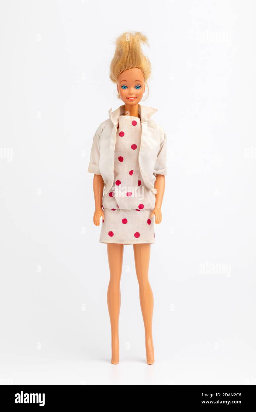 Ein Mädchen Puppe in einem weißen und roten Polka Punkt Kleid Stockfoto