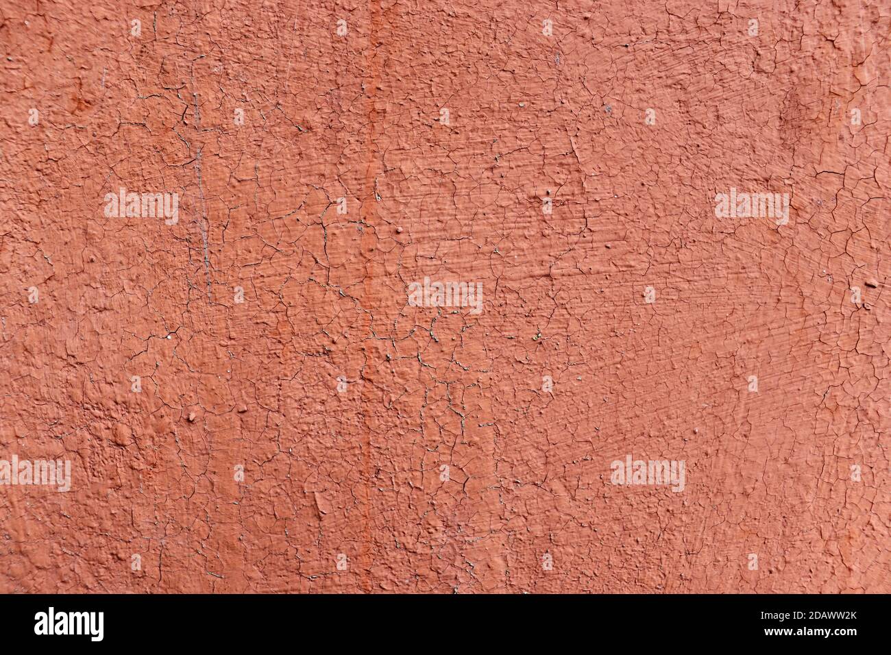 Rote Wandstruktur. Abstrakte Risse Wand Oberfläche Hintergrund. Roter Grunge Hintergrund Stockfoto