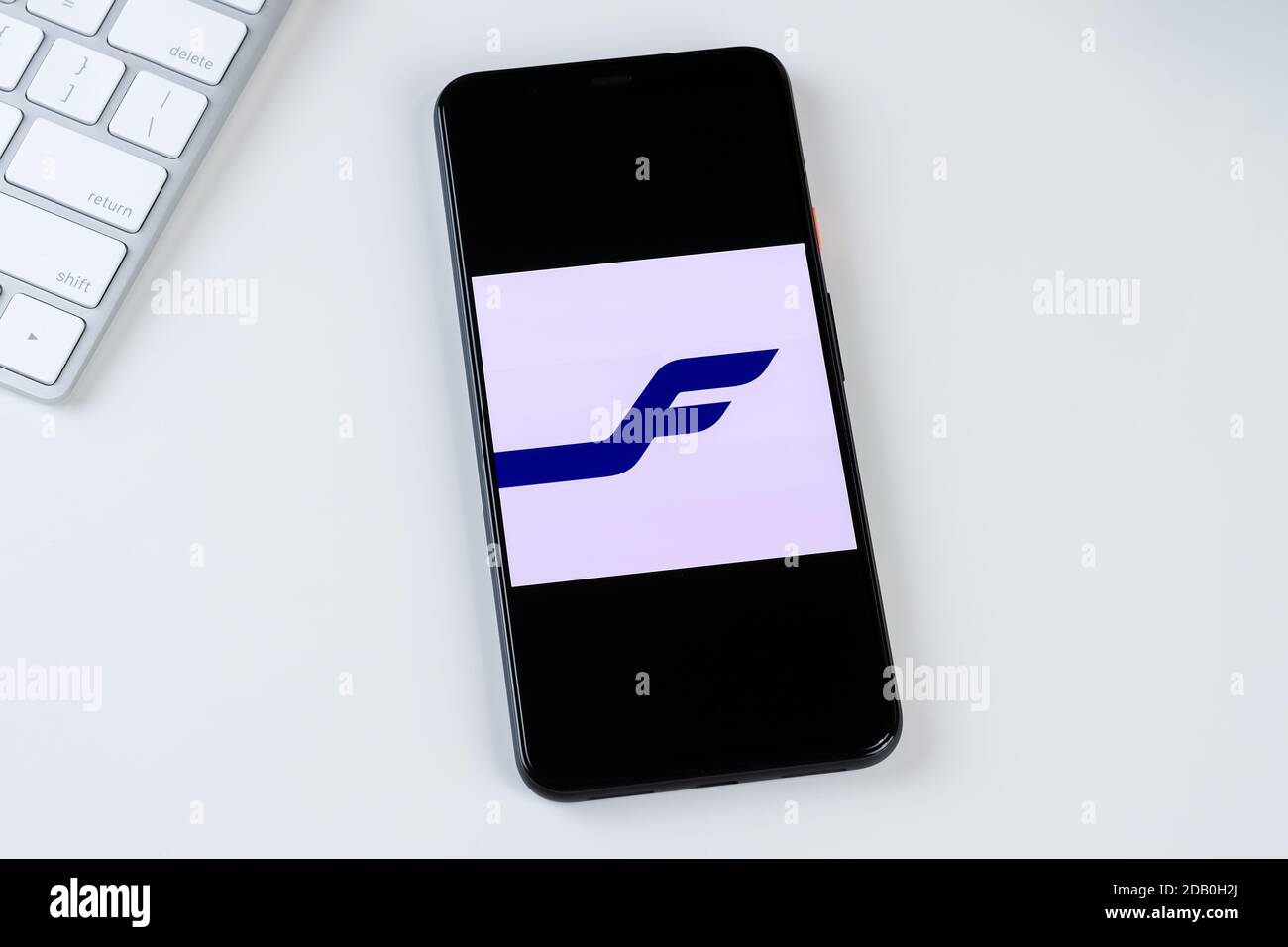 Logo der Finnair-App auf einem Smartphone-Bildschirm. Stockfoto