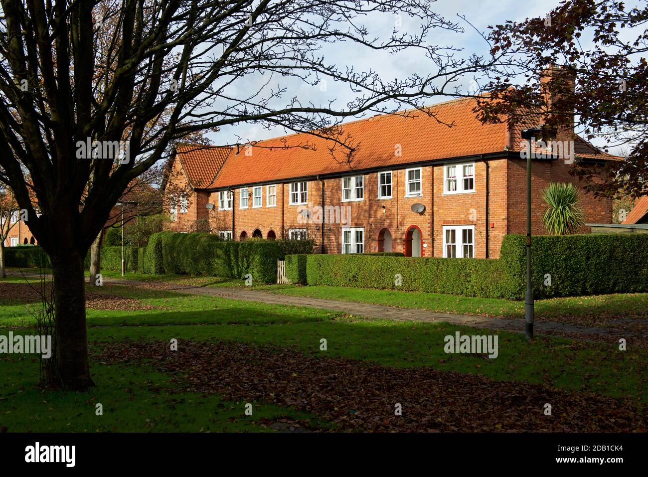 Gemauerte Häuser im Modelldorf New Earswick, in der Nähe von York, North Yorkshire, England Stockfoto