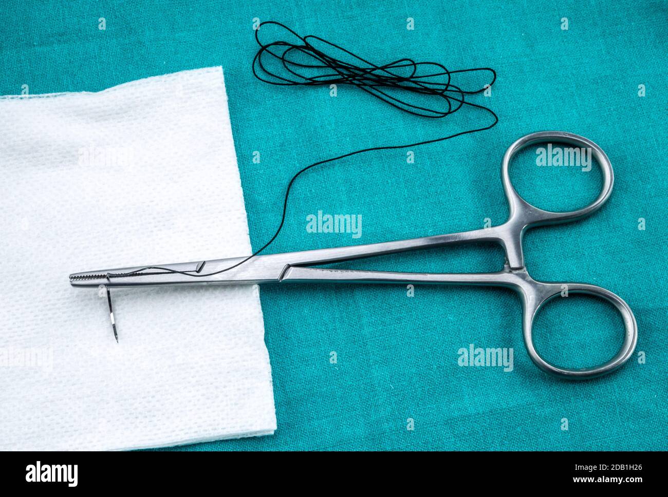 Chirurgischer Nahtfaden, konzeptuelles Bild Stockfoto