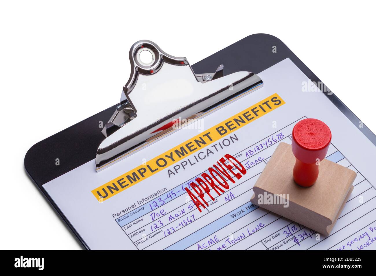 Genehmigte ausgefüllte Arbeitslosenanwendung mit Stamper. Stockfoto