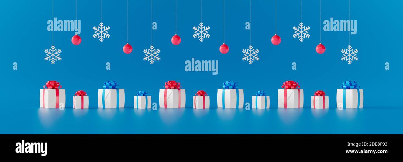 Weihnachtsgeschenke mit Schneeflocken und Weihnachtskugeln auf blauem Hintergrund 3d-Rendern 3d-Illustration Stockfoto