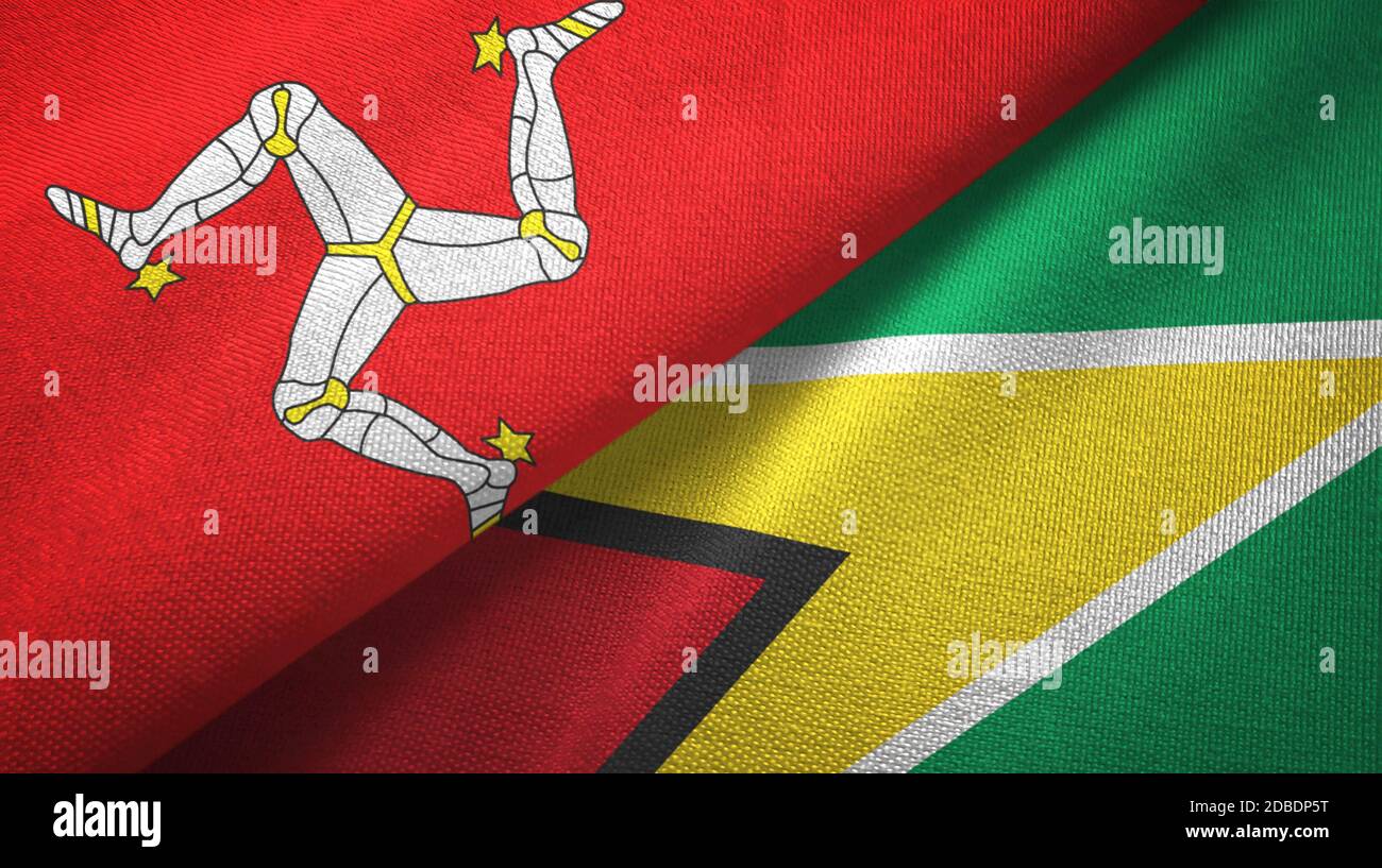 Isle of Mann und Guyana zwei Flaggen Textiltuch, Stoff Textur Stockfoto