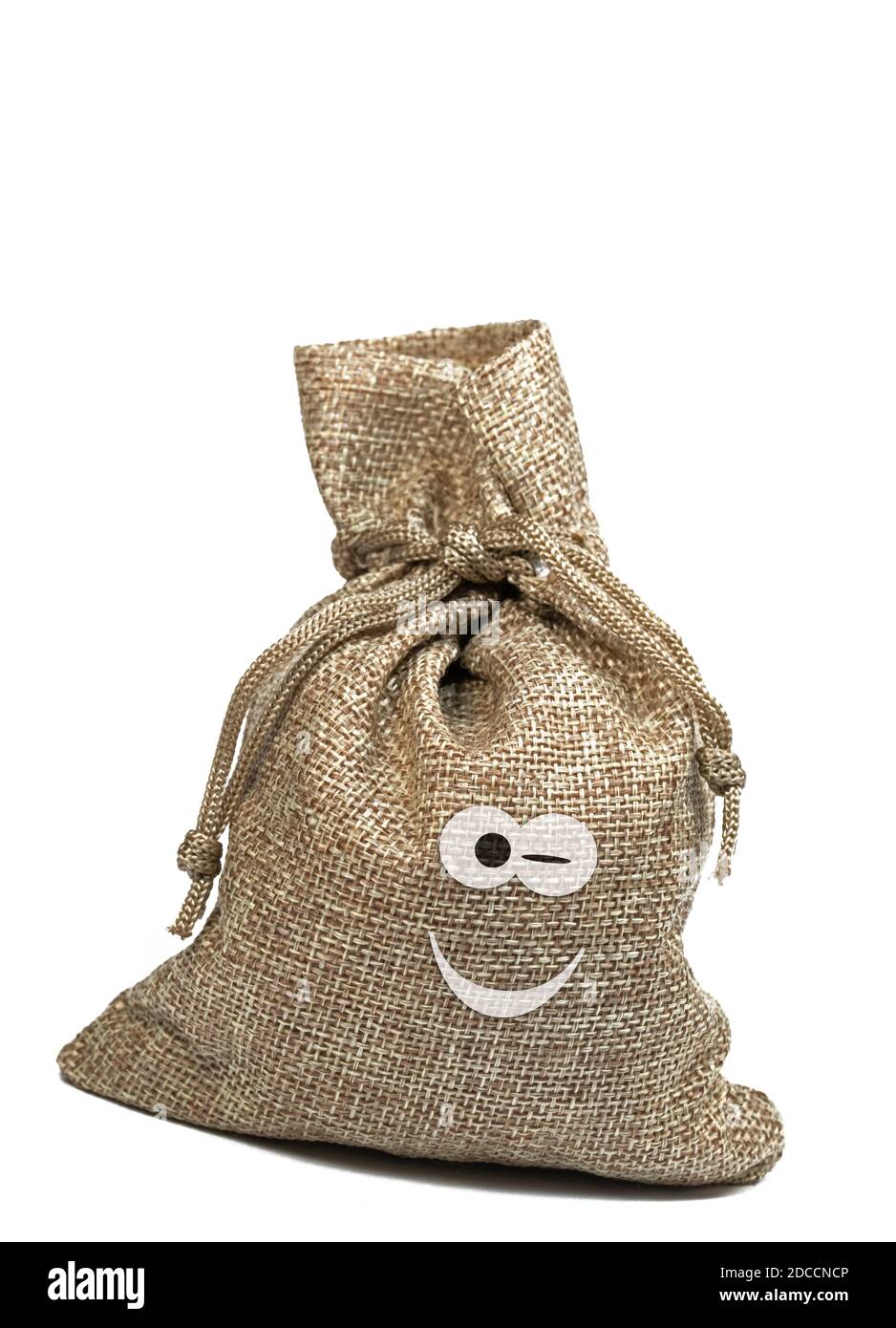 Jute Tasche mit einem lustigen Gesicht vor weißem Hintergrund Stockfoto