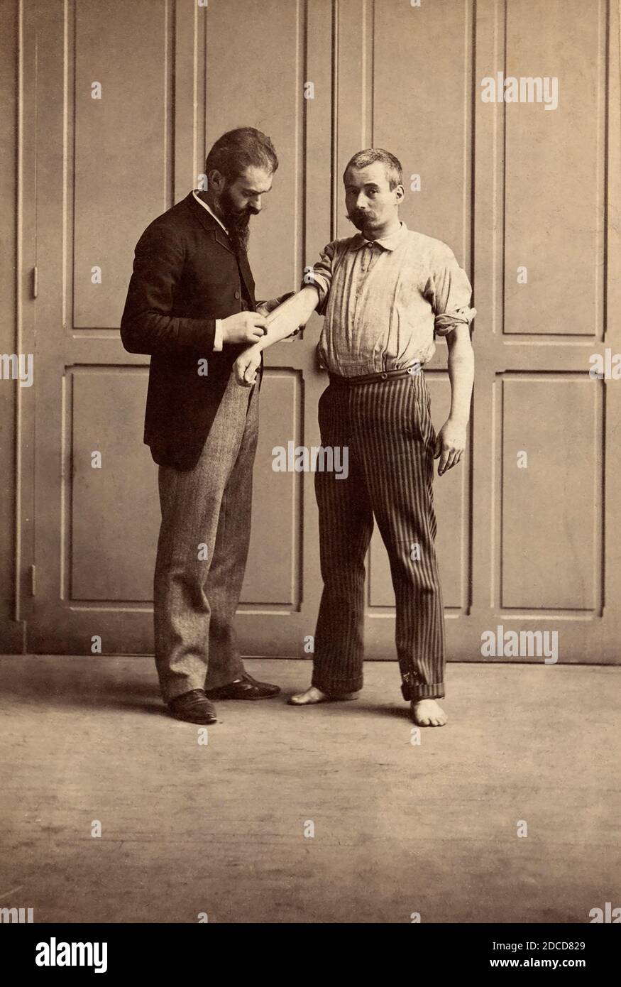 Alphonse Bertillon Measuring Prisoner, 1893 Stockfoto