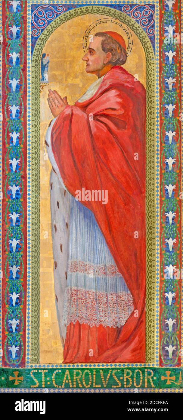 WIEN, AUSTIRA - 22. OKTOBER 2020: Das Fresko des hl.Karl Borromäus auf dem Seitenaltar der Pfarrkirche Kaisermühlen. Stockfoto