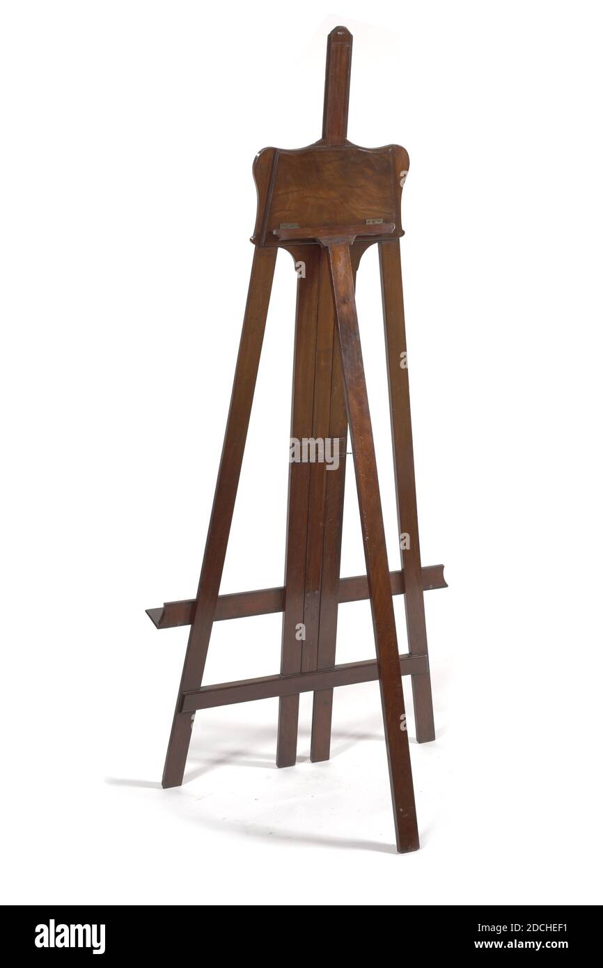 Staffelei, Anonymous, Eisen, Mahagoni, Messing, Mahagoni Staffelei mit zwei schmalen aufrechten Pfosten an der Vorderseite, die als Beine dienen. Dazwischen ein breites aufrecht in der Mitte, das nicht den Boden erreicht. Ein breiter Grat ist horizontal auf diesem breiten aufrecht montiert, auf dem ein Gemälde stehen kann. In der unteren Mitte der Leiste ein Messingknopf, mit dem eine Messingklammer betätigt wird, mit dem die aufrechte Kante in der Höhe verstellbar ist. Die aufrechte Seite hat rechteckige Aussparungen links und rechts, wo die Klammer fällt, wenn eine bestimmte Höhe gewählt wird. An der Rückseite des mittleren Pfostens ist ein Metallauge, an dem ein Stockfoto