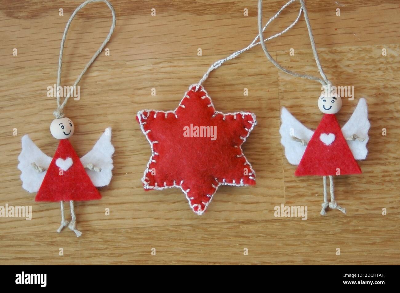 Filz Weihnachtsstern und Engel Hand genht einzigartige Dekorationen  Stockfotografie - Alamy