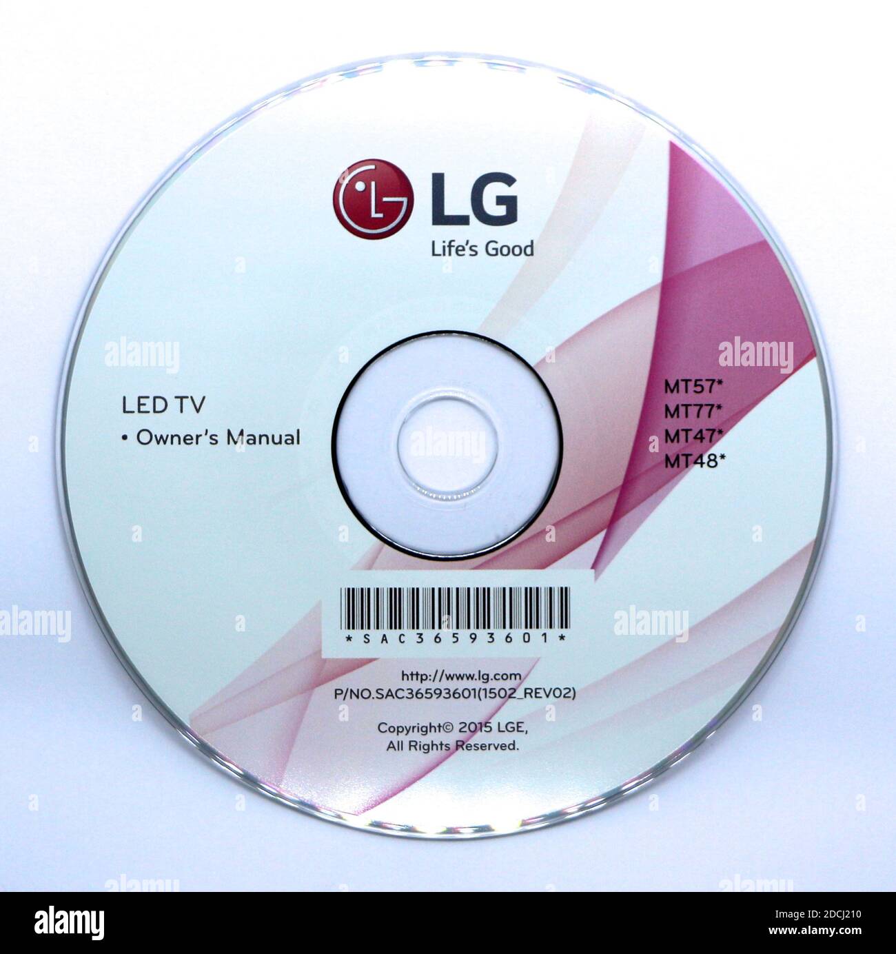 Foto eines LG-Fernseherhandbuchs auf einer weißen und rosa cd auf weißem Hintergrund Stockfoto