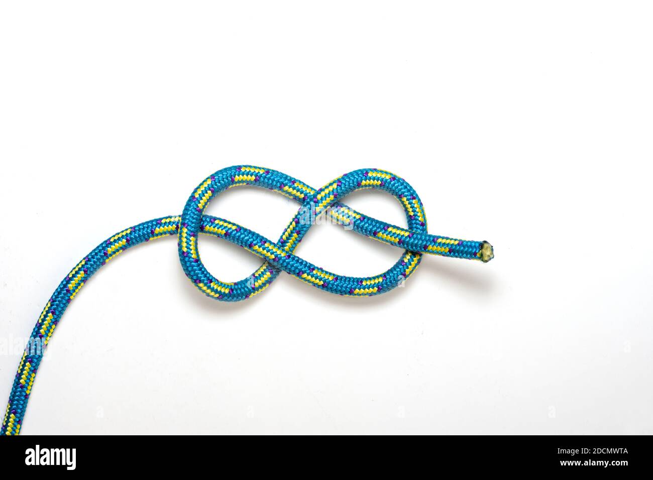 Lose Figur 8 Knoten auf weißem Hintergrund Stockfoto