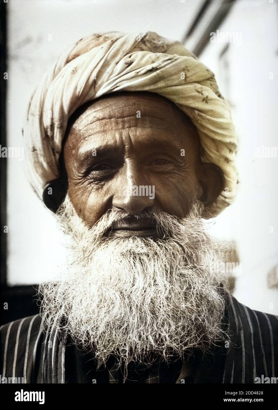 Ein Mann in Duschanbe in Tadschikistan, Bezirkshandstempel, 1970er Jahre. Ein Mann von Duschanbe in Tadschikistan, Sowjetunion, 1970er Jahre. Stockfoto