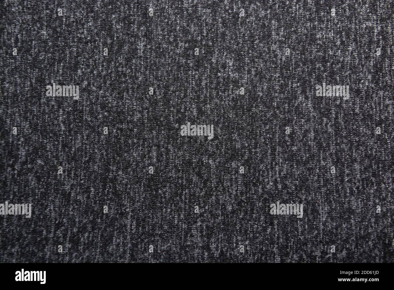 Farbverlauf dunkelgrauer Hintergrund mit textiler Textur Stockfoto