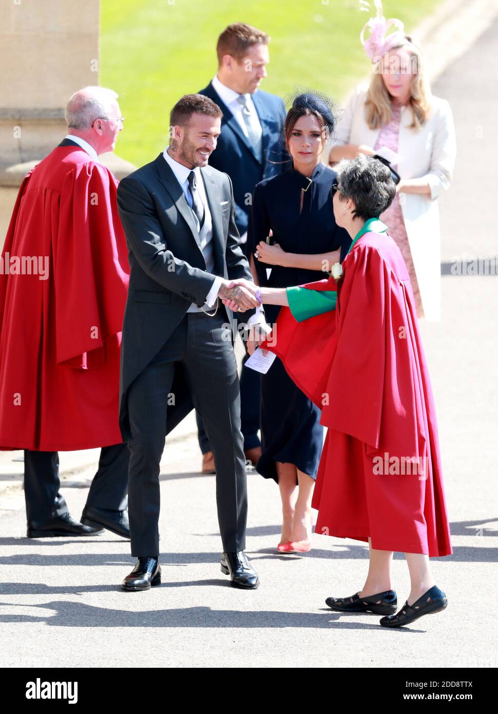 Die britische Modedesignerin Victoria Beckham (C-R) und ihr Ehemann, der ehemalige britische Fußballspieler David Beckham (C-L), kommen zur königlichen Hochzeitszeremonie von Großbritanniens Prinz Harry und Meghan Markle am 19. Mai 2018 in der St. George's Chapel in Windsor Castle, in Windsor, Großbritannien, an. Foto von Lauren Hurley/ABACAPRESS;COM Stockfoto