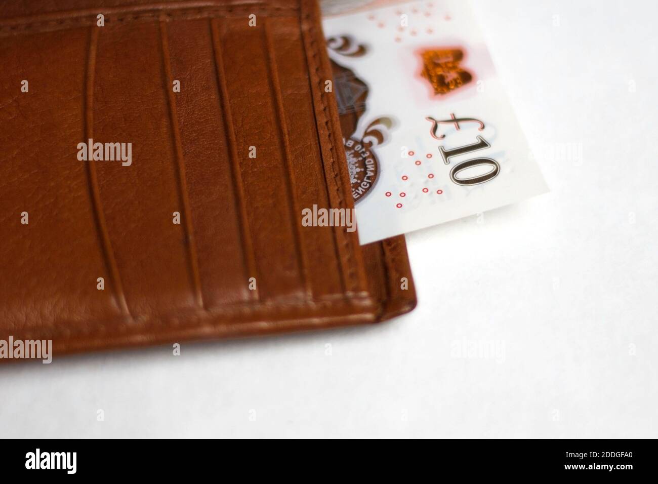 Zehn Pfund Banknote in einer Tasche Stockfoto