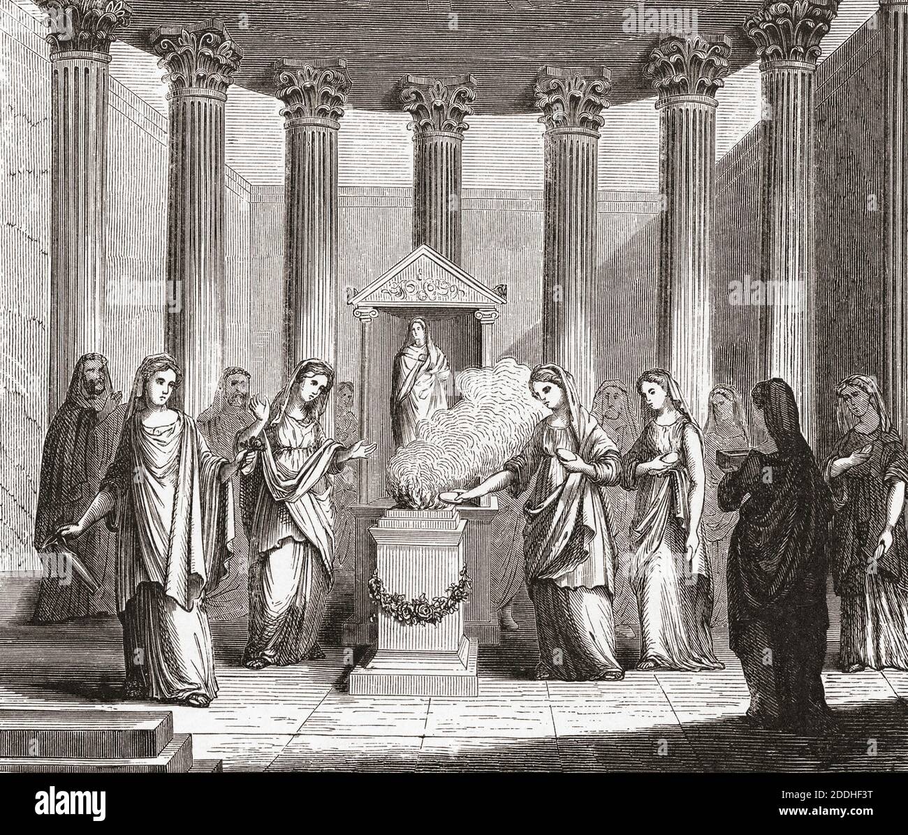 Vestaljungfrauen im alten Rom, die das heilige Feuer in ihrem Tempel beweiden. Nach einer Illustration eines unbekannten Künstlers aus dem 19. Jahrhundert. Stockfoto