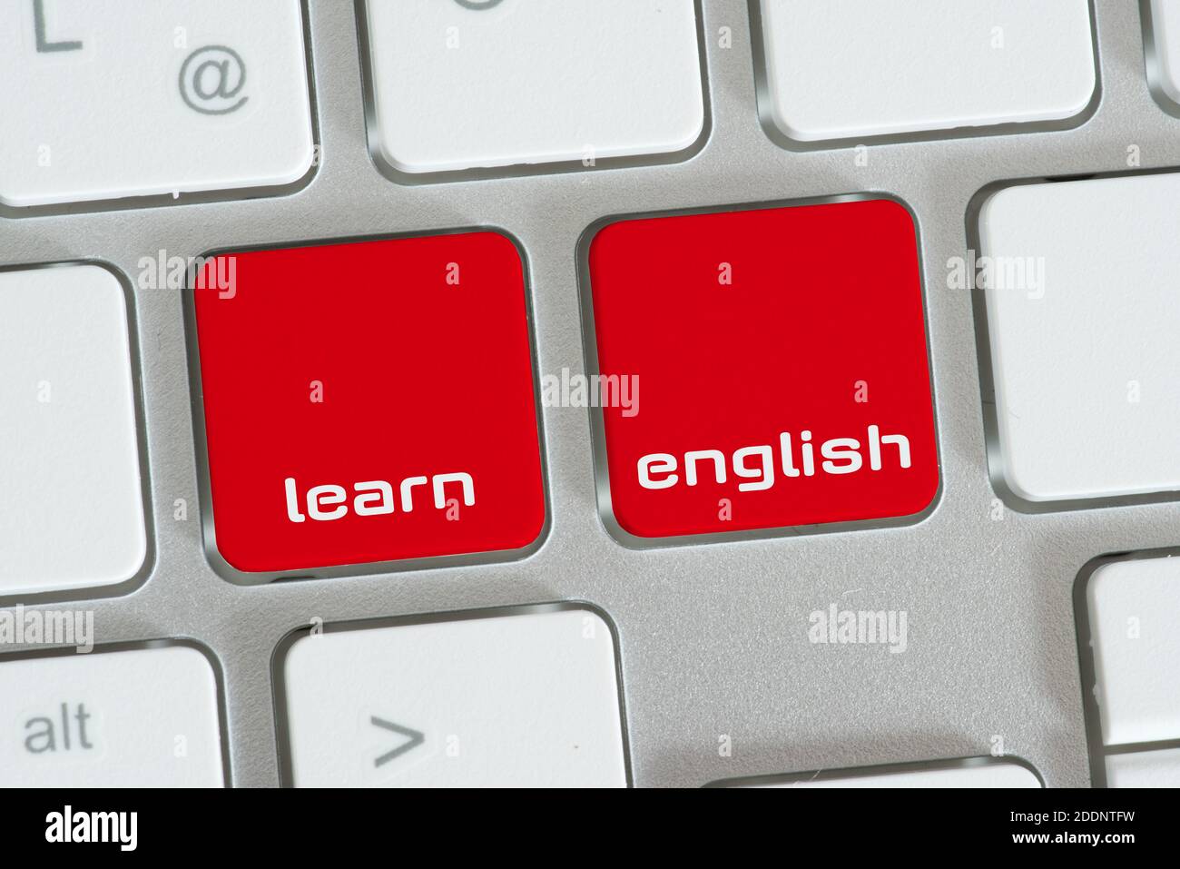 Ein Computer und Schlüssel zum Englischlernen Stockfoto