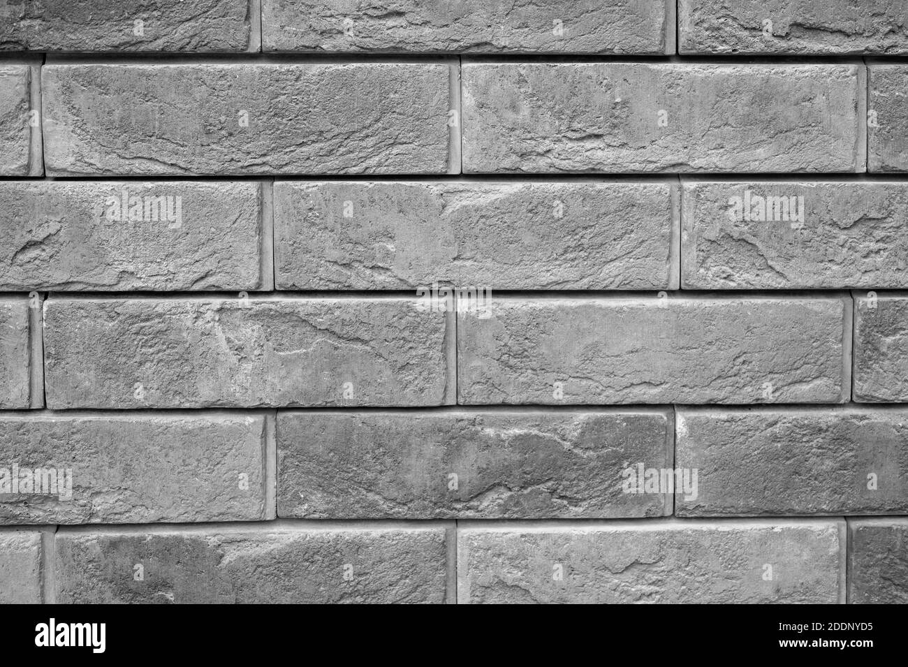 Muster der dekorativen grauen Schiefer Stein Wandfläche als Hintergrund. Getöntes Grau Stockfoto