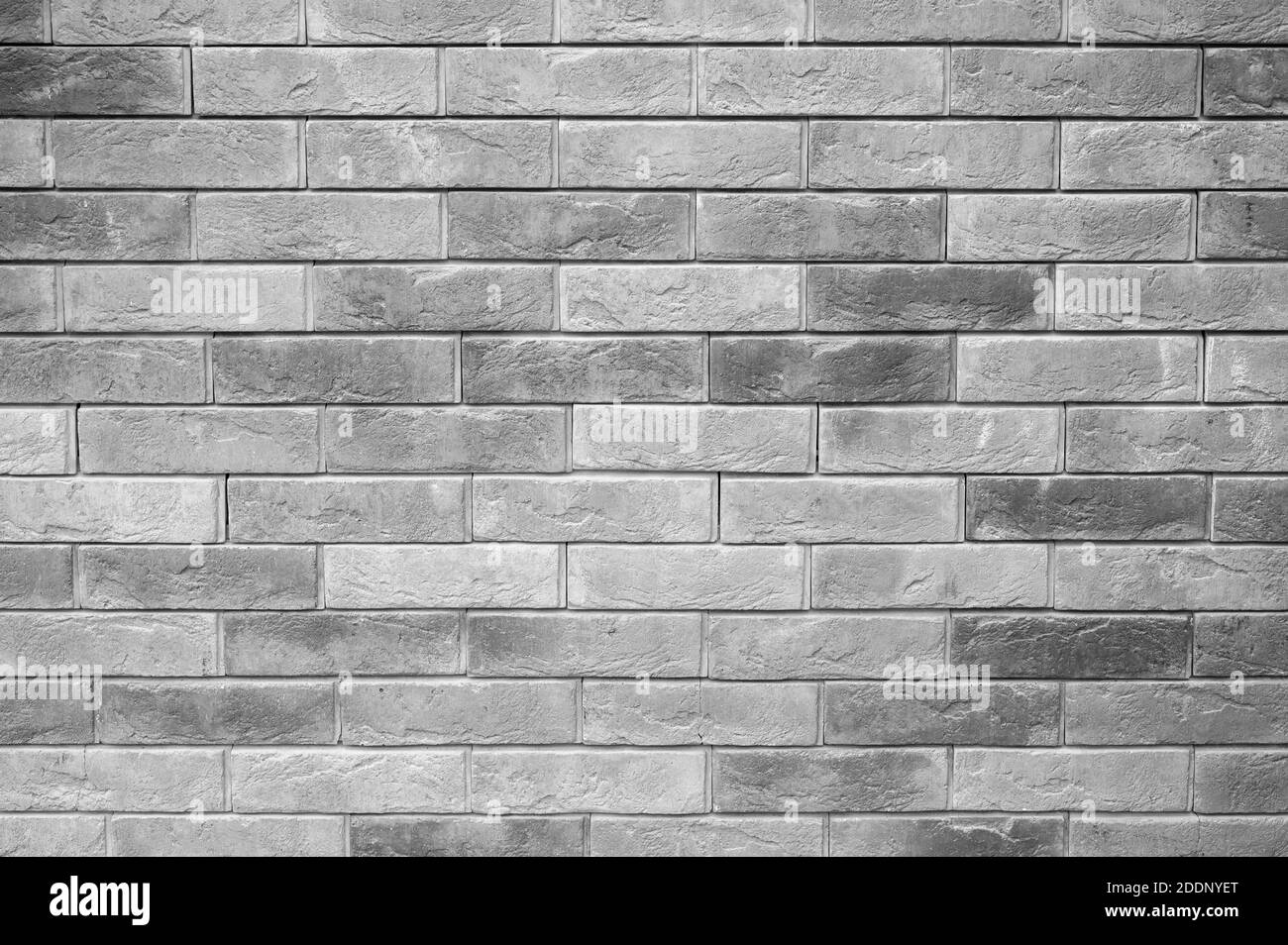 Muster der dekorativen grauen Schiefer Stein Wandfläche als Hintergrund. Getöntes Grau Stockfoto