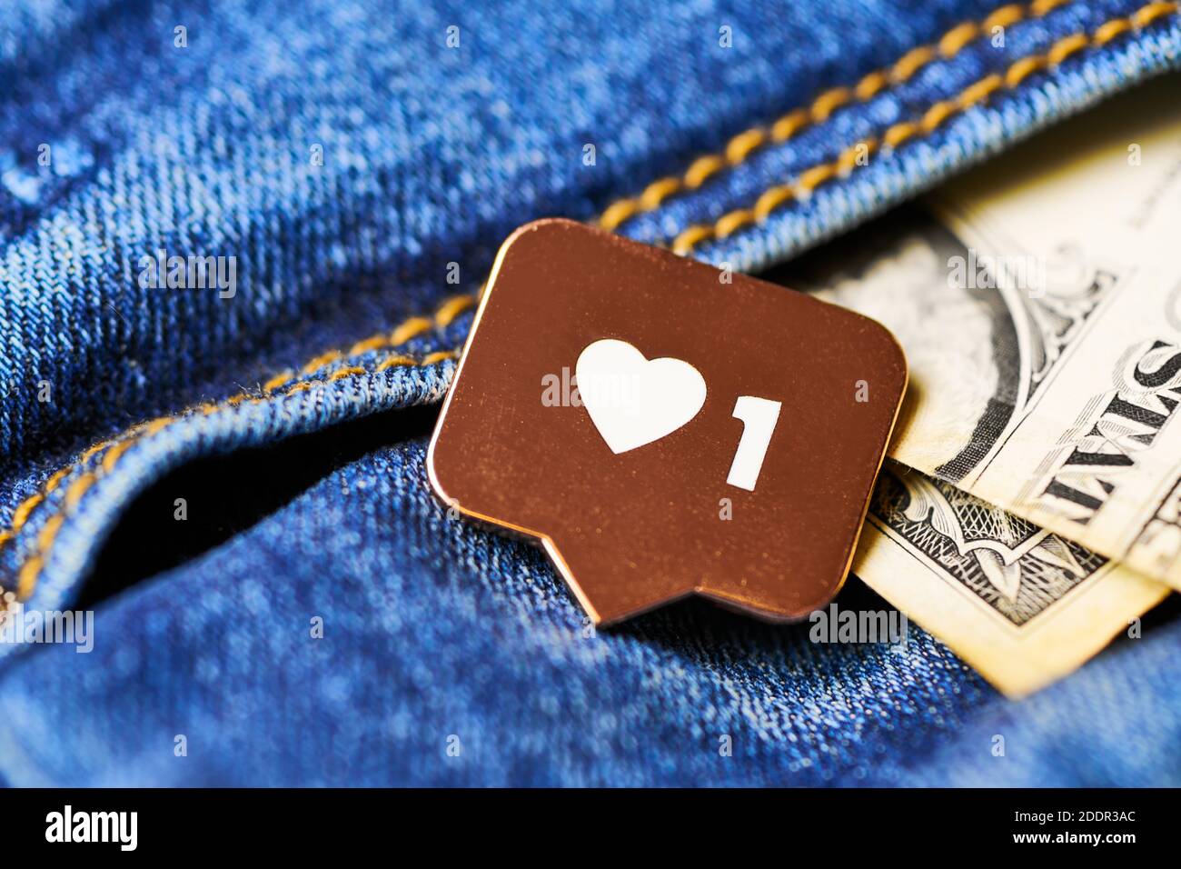 Wie Herz Symbol und Dollar in Jeans Tasche. Wie Zeichen-Taste, Symbol mit  Herz und eine Ziffer. Social Media Network Marketing Stockfotografie - Alamy