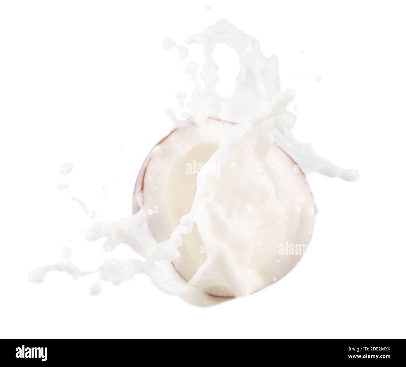 Kokosnuss mit Milchspritzer isoliert auf weißem Hintergrund. Stockfoto