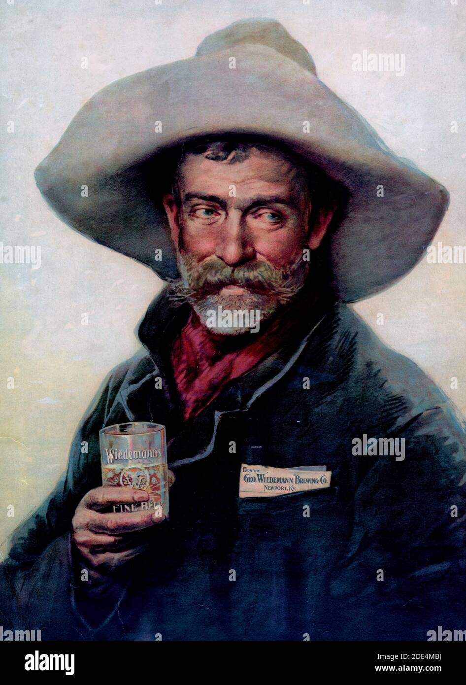 Tradecard für Wiedemann Bier: alte Cowboy holding Glas Wiedemann's  Stockfotografie - Alamy