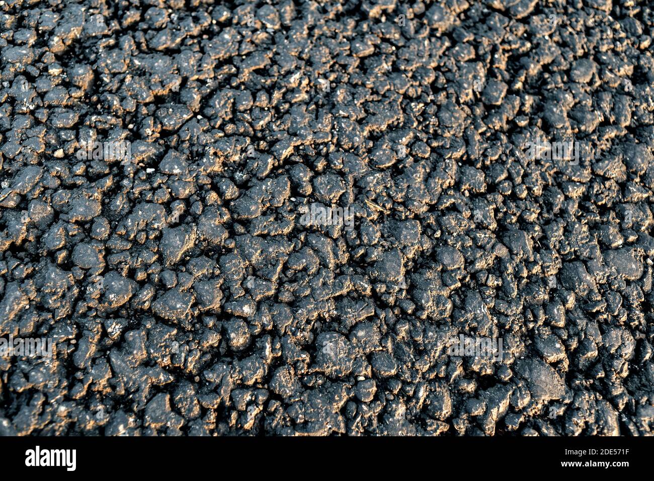 Textur der neuen Asphaltstraße Nahaufnahme Stockfoto