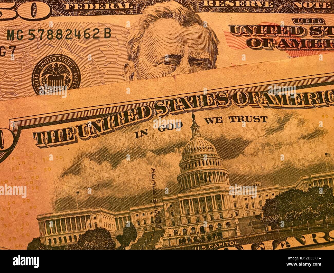Obwohl es in den Vereinigten Staaten eine Trennung von Kirche und Staat gibt, heißt es in seiner Währung: "In God We Trust" Stockfoto