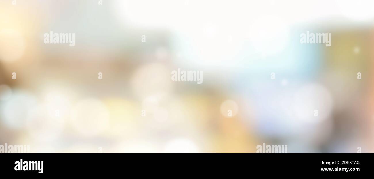 Verschwommener abstrakter Hintergrund mit unbestimmten weißen, goldenen und gelben Formen - horizontales Panorama-Webbanner Stockfoto