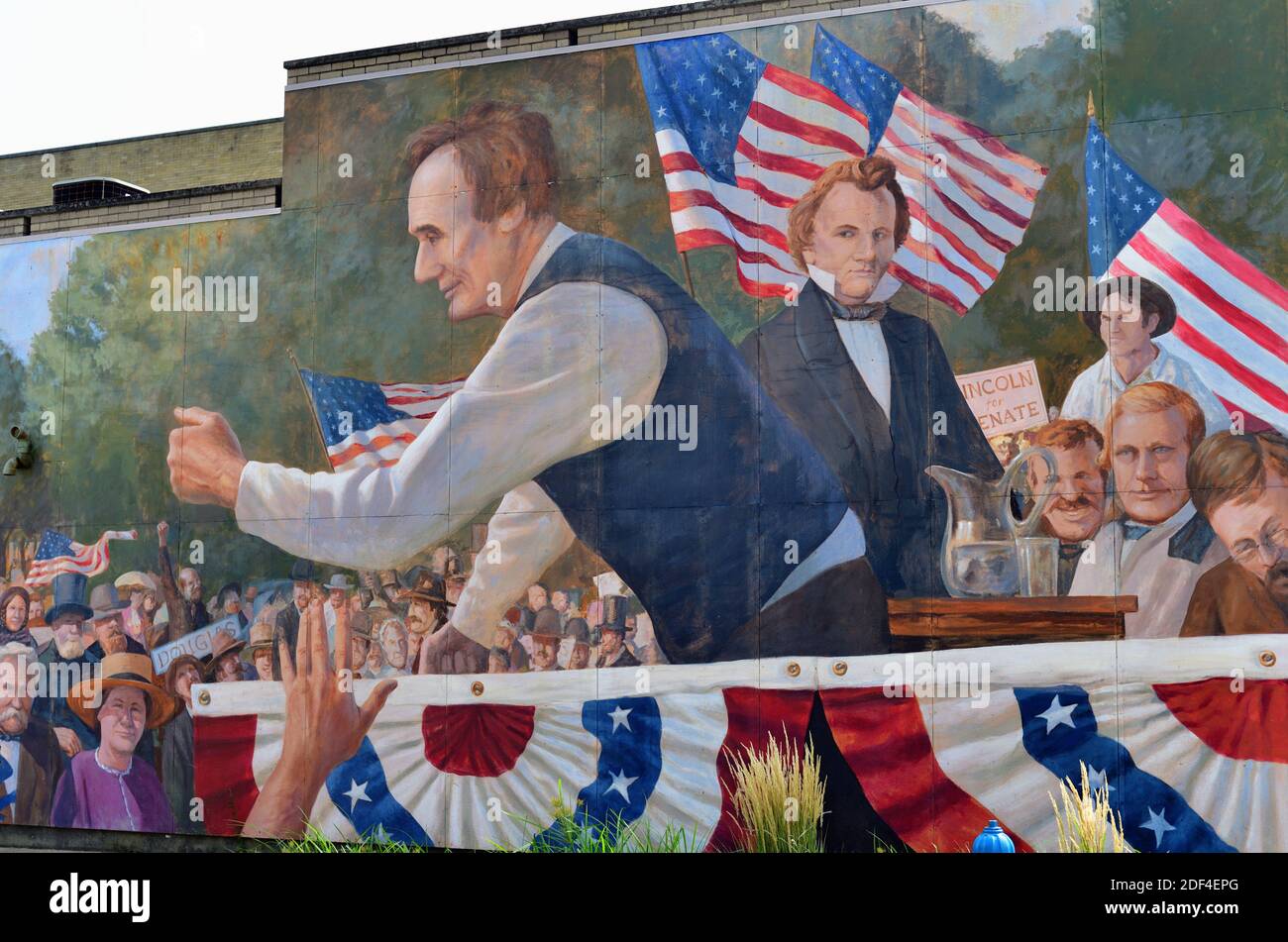 Ottawa, Illinois, USA. Ein Wandgemälde von Abraham Lincoln und Stephen Douglas ziert eine Wand neben Ottawas historischem Washington Square Park. Stockfoto