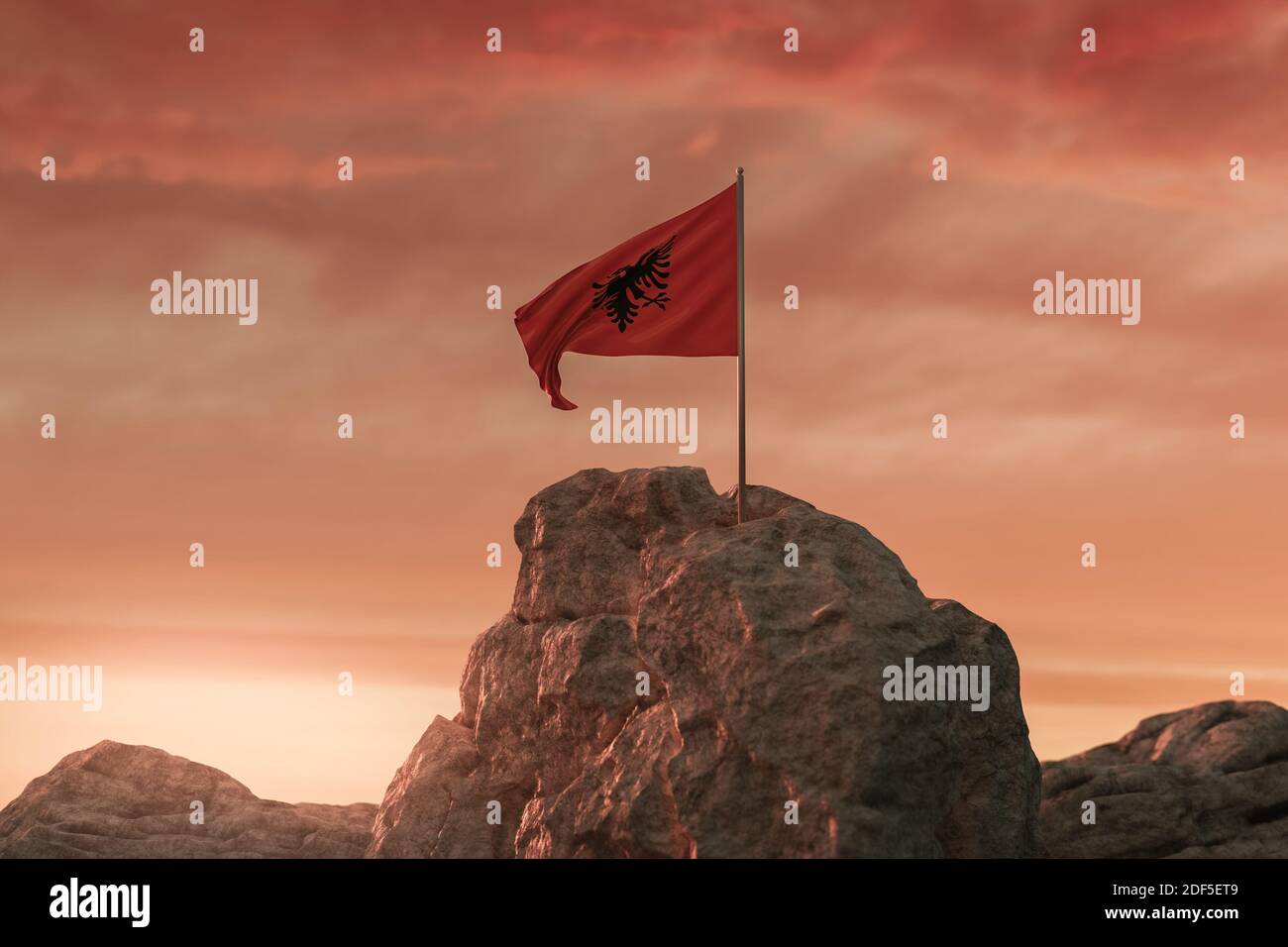 3D-Rendering von Winken albanische Flagge auf der felsigen Landschaft der Nationalfeiertag am 28. November zu feiern. Stockfoto