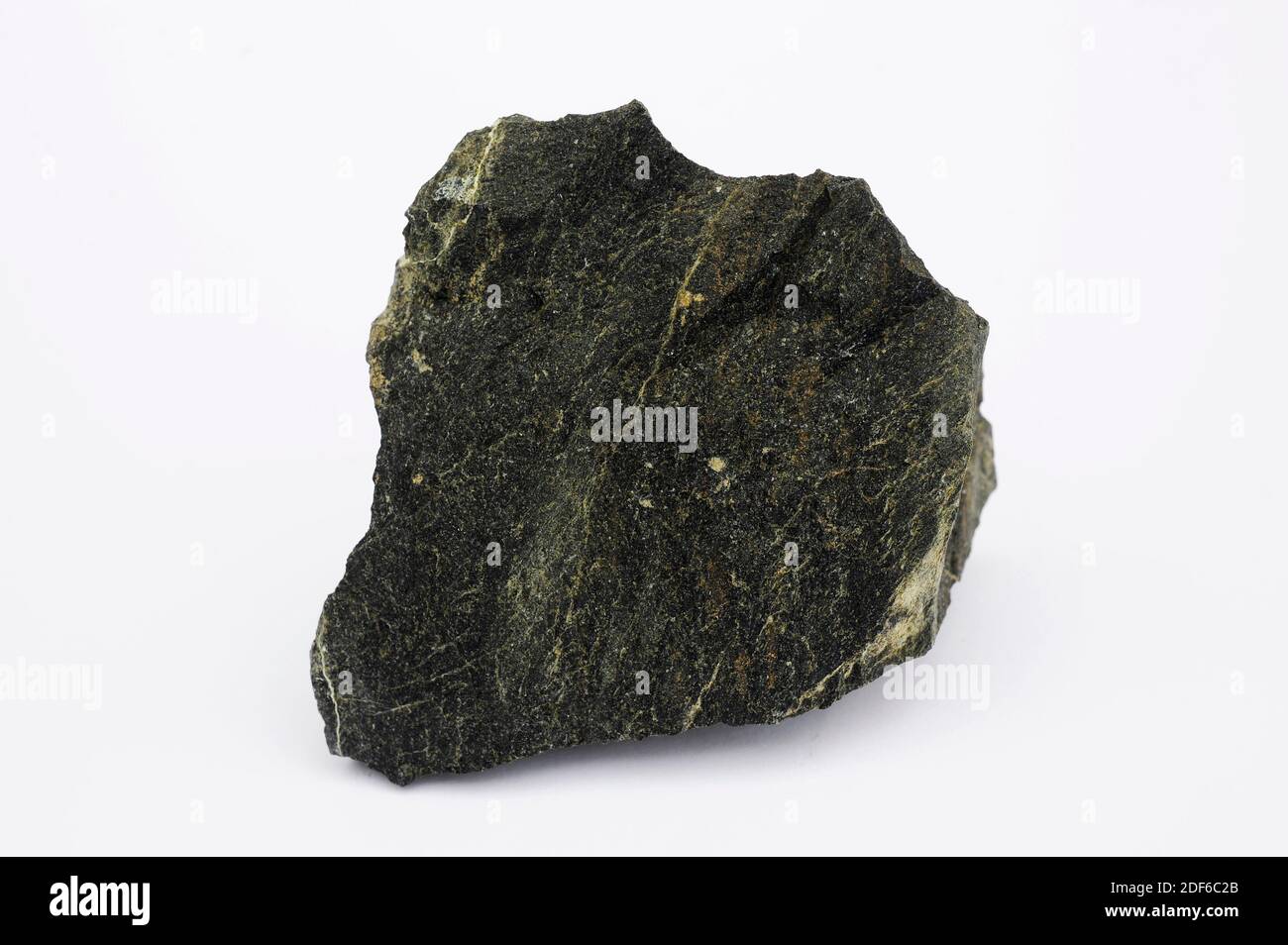 Dunit oder Olivinit ist ein Plutongestein, das überwiegend aus Olivin (Eisen-Magnesium-Silikat) besteht. Diese Probe stammt aus Cabo Ortegal, La Coruna, Stockfoto