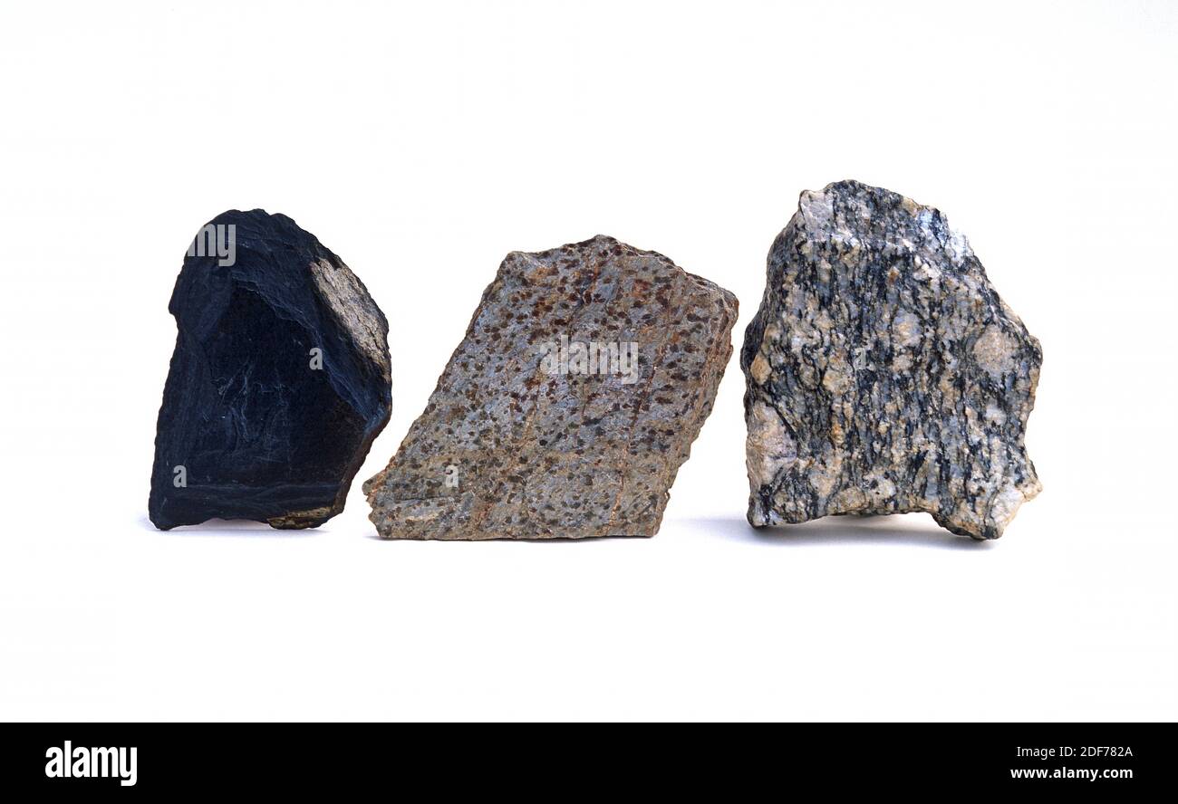 Drei Beispiele metamorphischer Gesteine, von links nach rechts: Schiefer, Schiefer und Gneis. Stockfoto