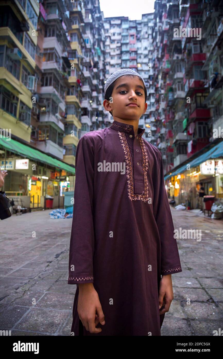 Hong Kong, Quarry Bay, muslimisches Kind in Montane Mansion Stockfoto