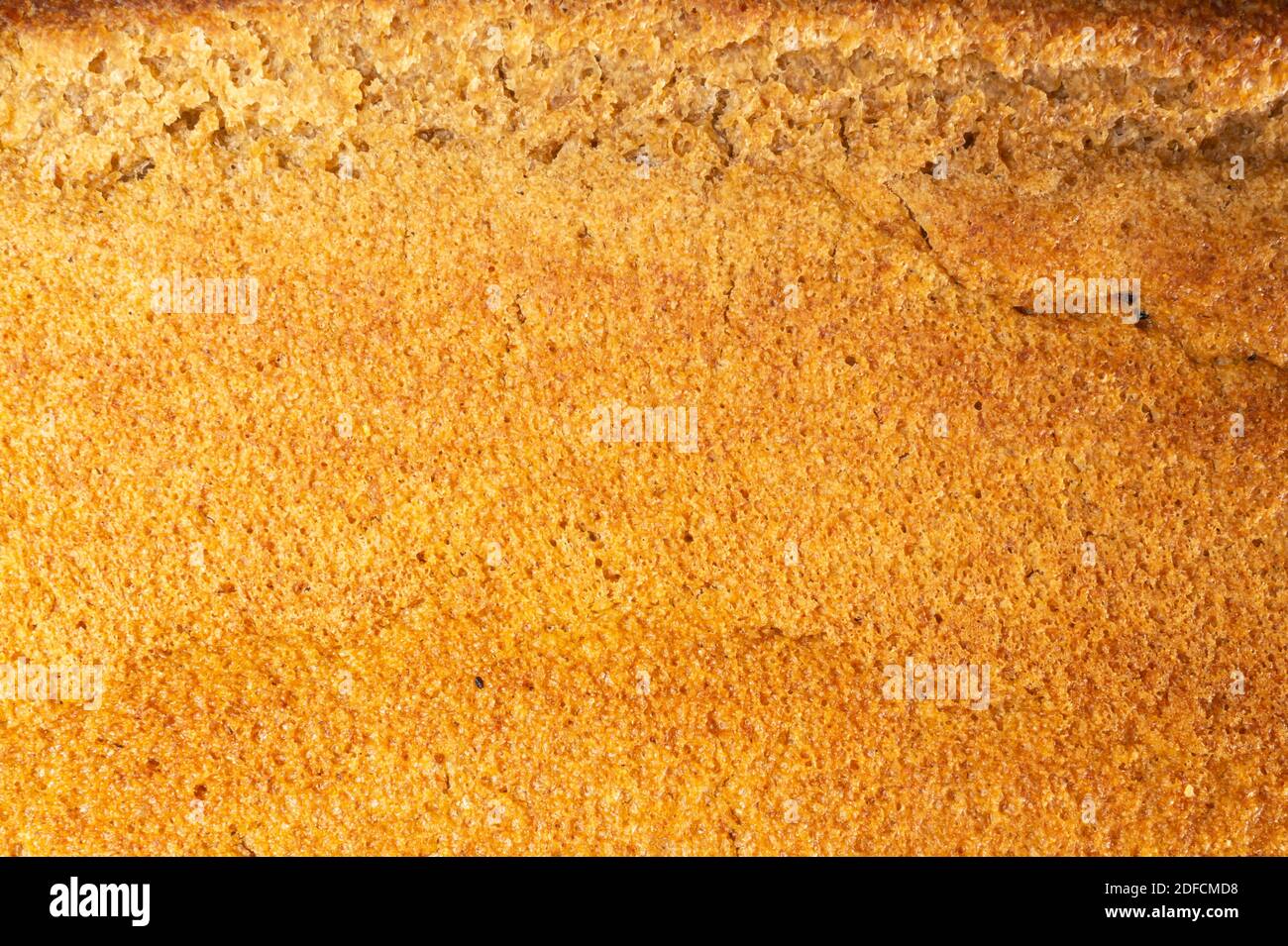 Die Textur des Brotlaibs aus der Nähe. Die Produkte der Fütterung aus Roggenmehl Stockfoto