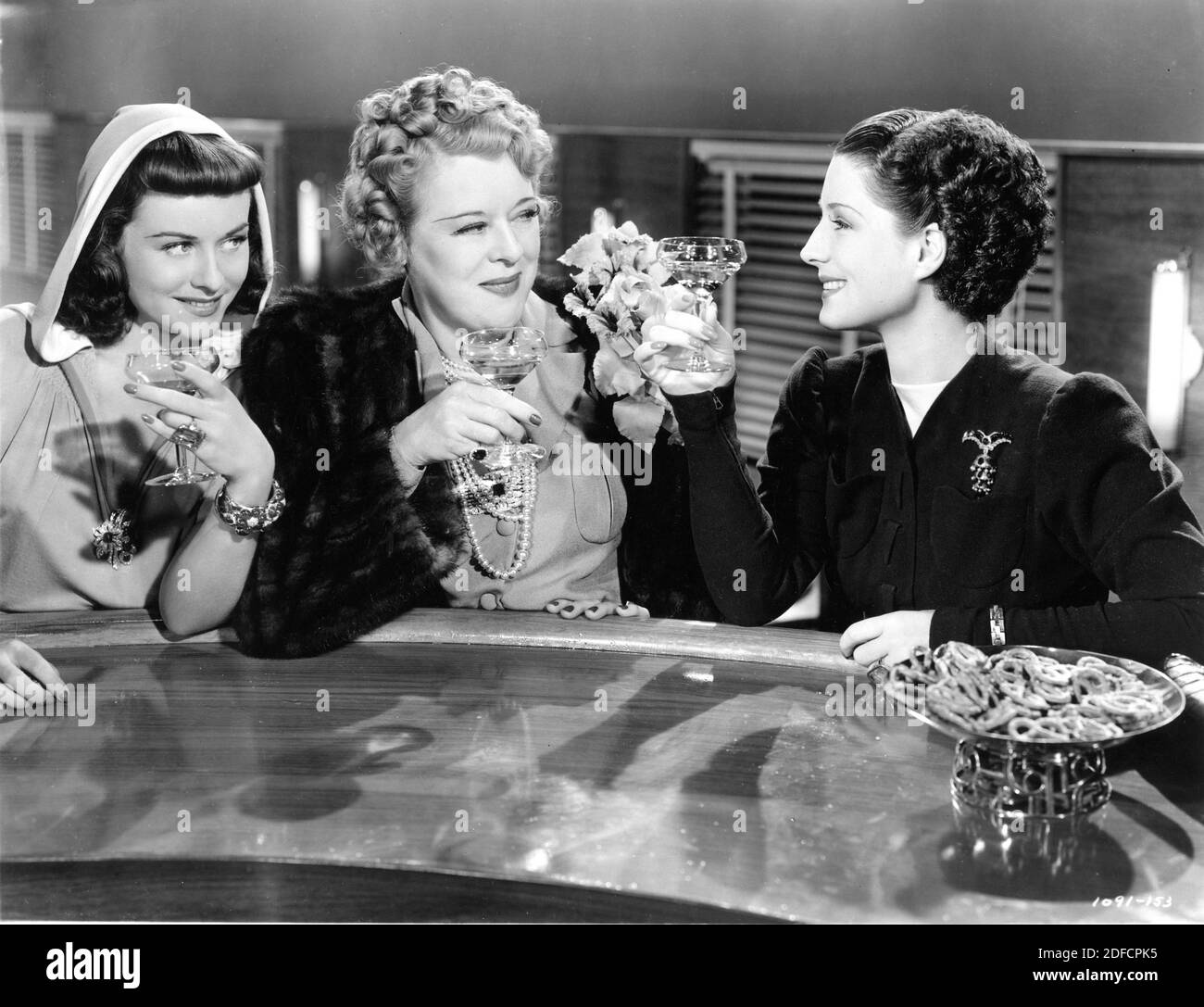 PAULETTE GODDARD MARY BOLAND UND NORMA SHEARER IN DEN FRAUEN 1939 Regisseur GEORGE CUKOR Theaterstück von Clare Boothe Luce Rowns Gilbert Adrian Metro Goldwyn Mayer Stockfoto