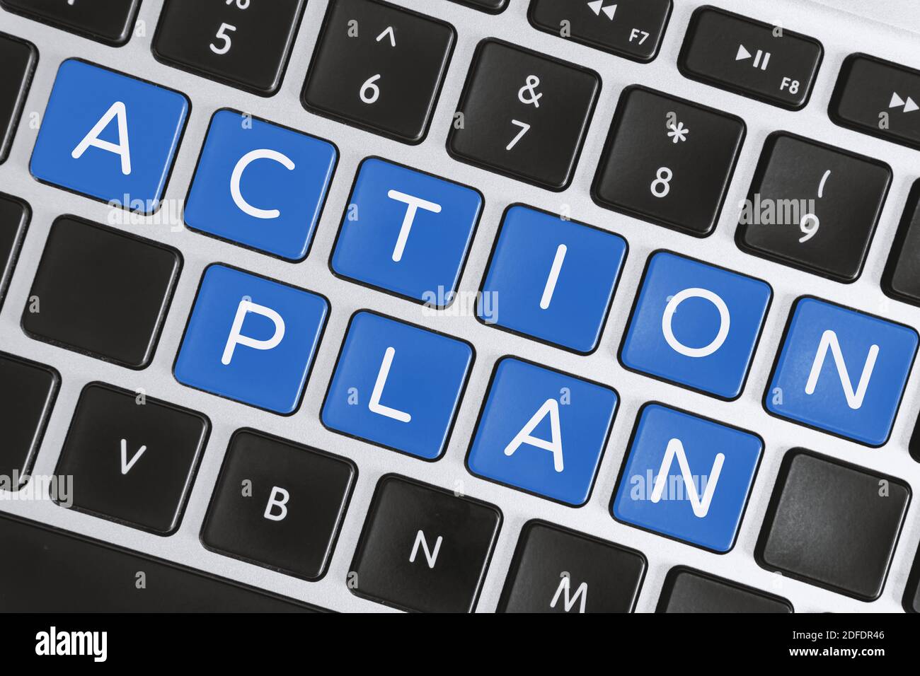 Geschäftsstrategie und Planungskonzept. Aktionsplan Word auf der Computertastatur. Stockfoto