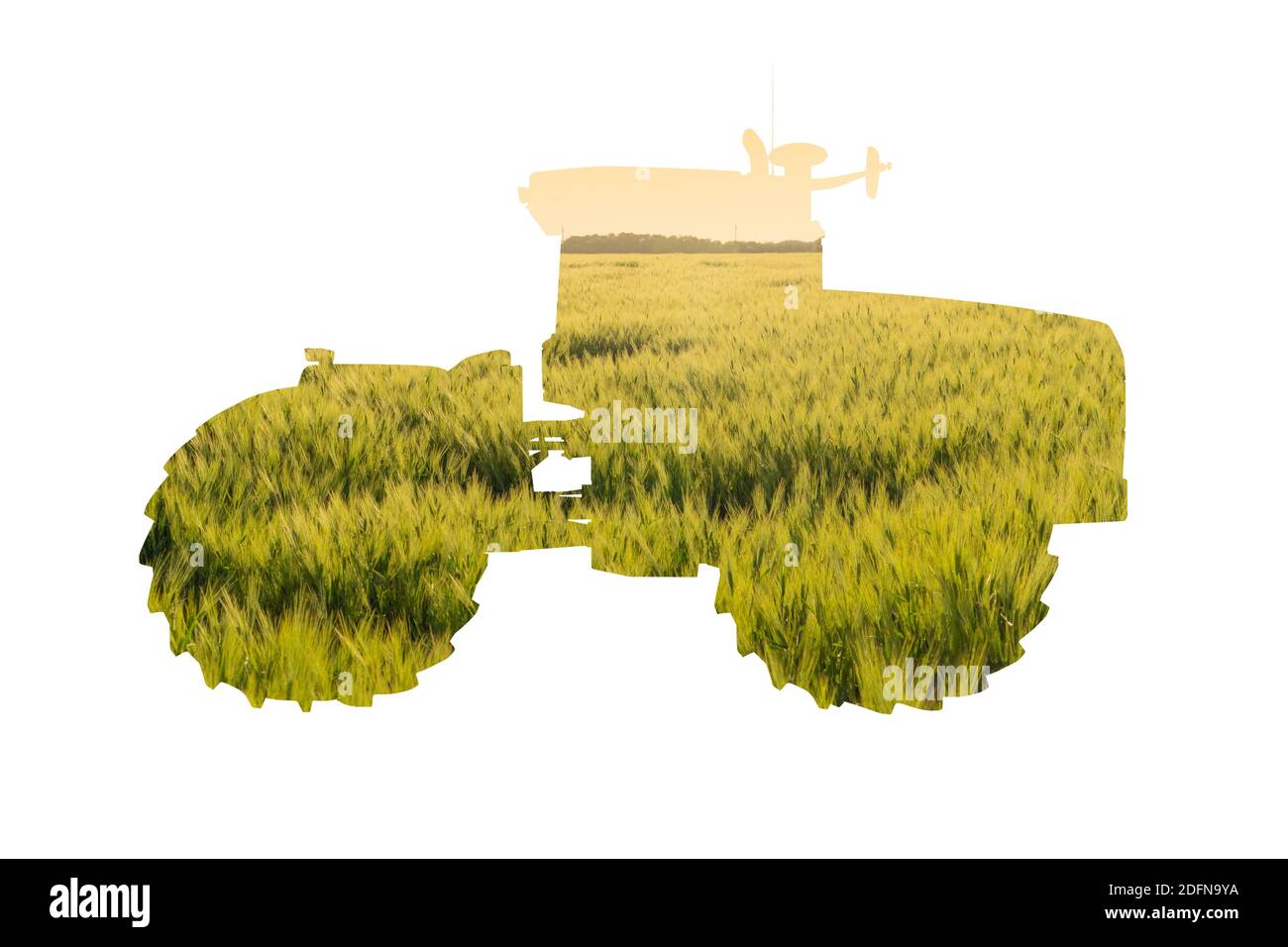 Silhouette eines Traktors mit landwirtschaftlichem Feld Stockfoto