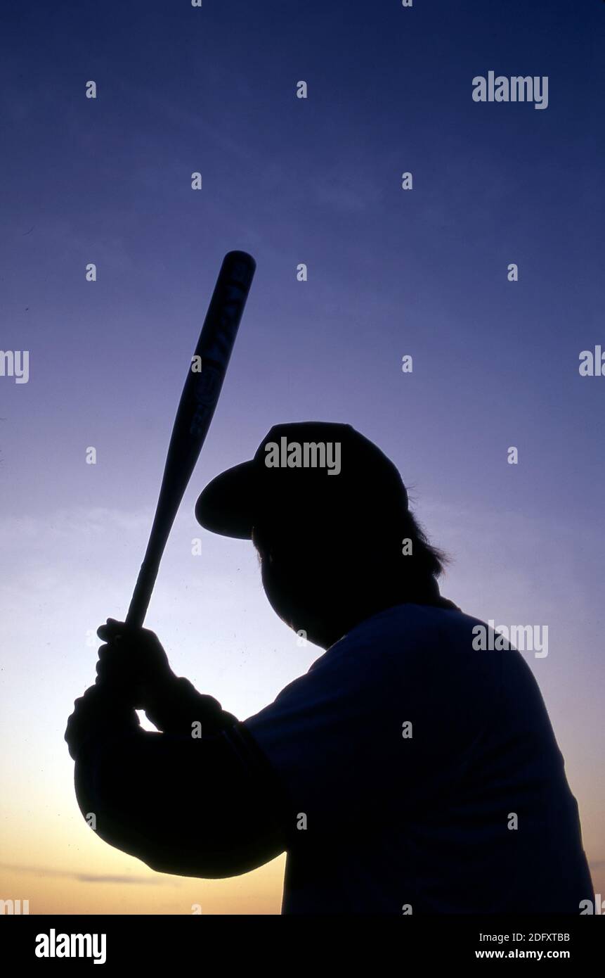 Baseball-Spieler mit Fledermaus Stockfoto