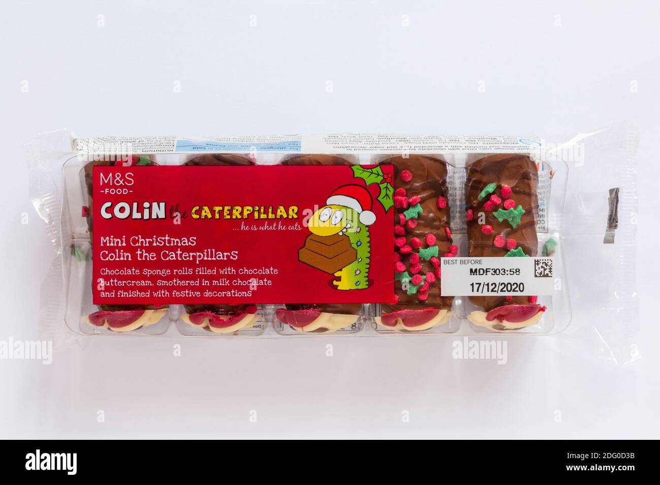 Paket von Marken & Spencer Colin the Caterpillar - Mini Weihnachten Colin die Raupen Kuchen isoliert auf weißem Hintergrund ideal Zu Weihnachten Stockfoto