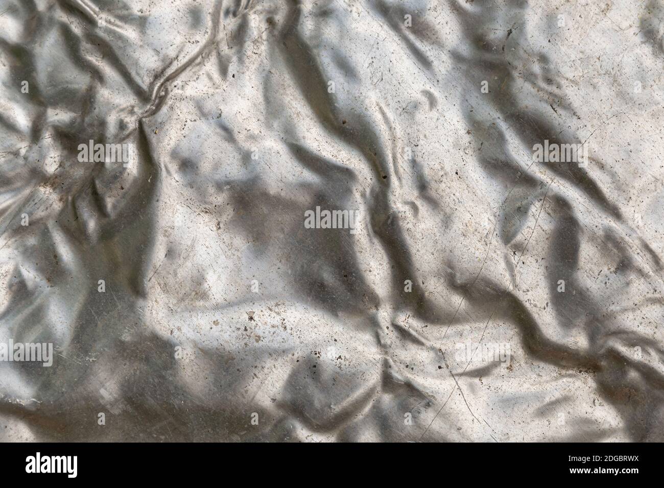 Hintergrund metallisch ungleichmäßig und zerknittert Wirkung der flüssigen Metallbasis Stockfoto